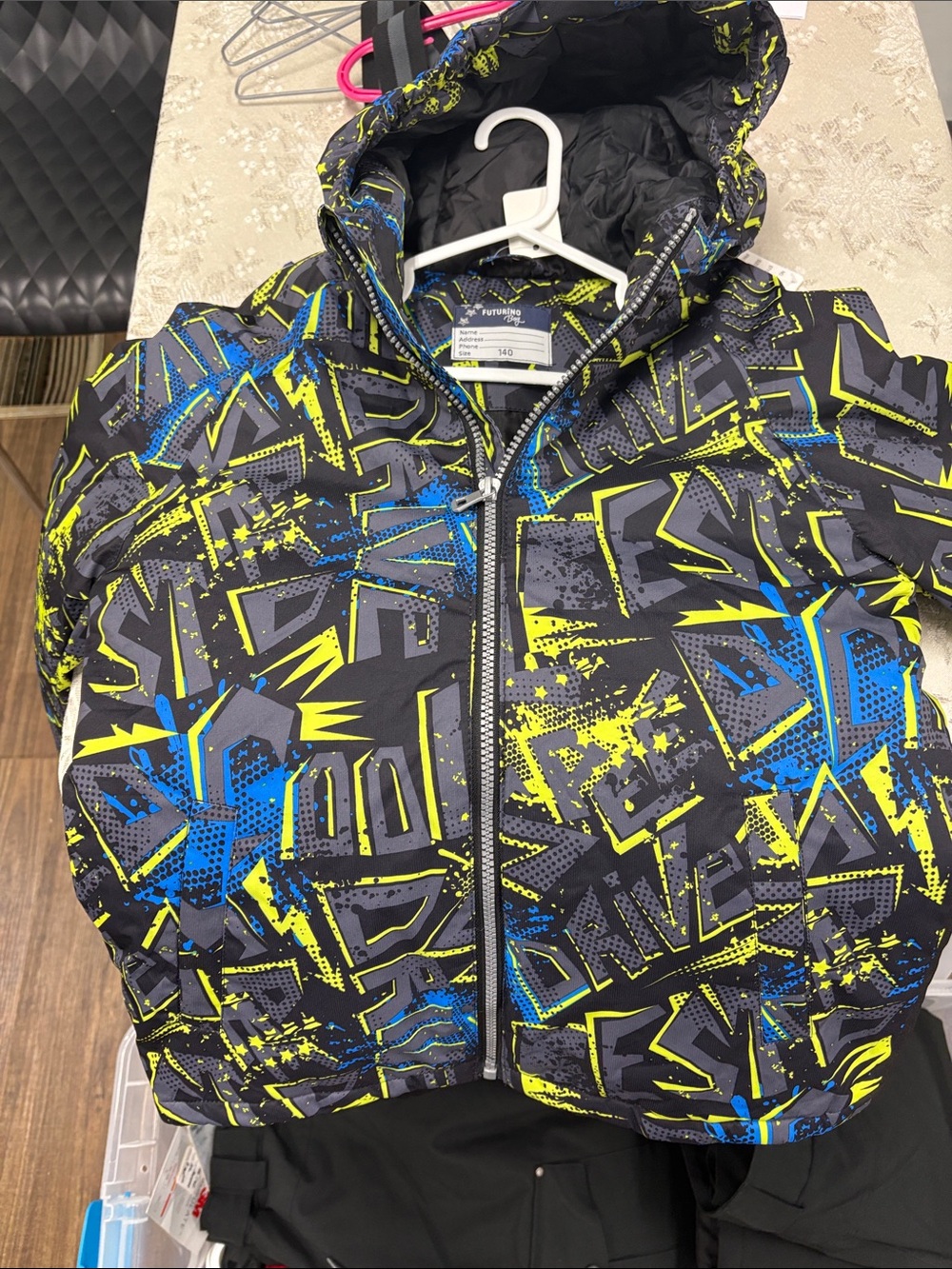 Kids Hooded Puffer Jacket in Black with Blue & Neon Yellow Graphics